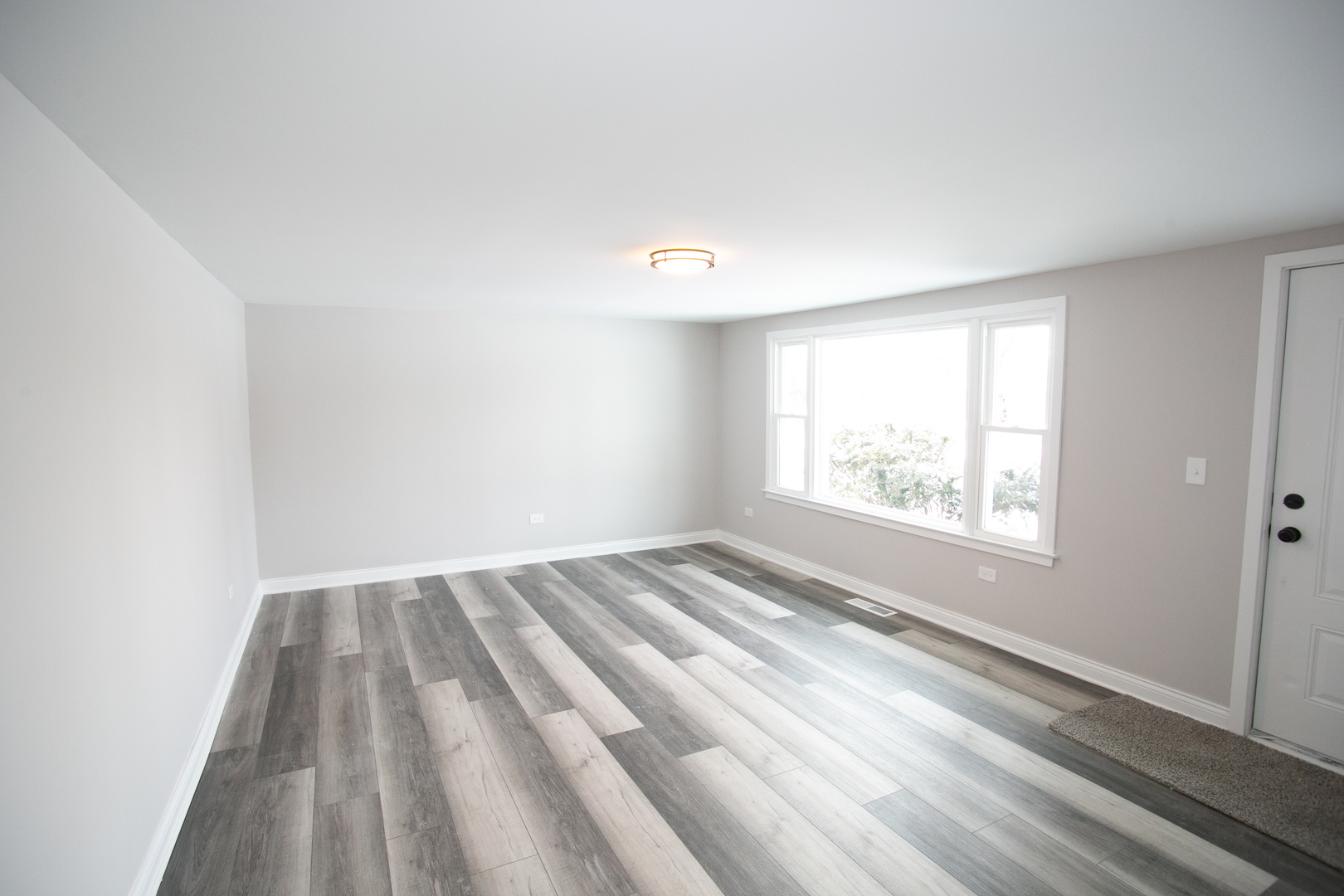 15039 Copter Lane Romeoville, IL 60446 - Photo 7 of 17 wooden floor in an empty room with a window