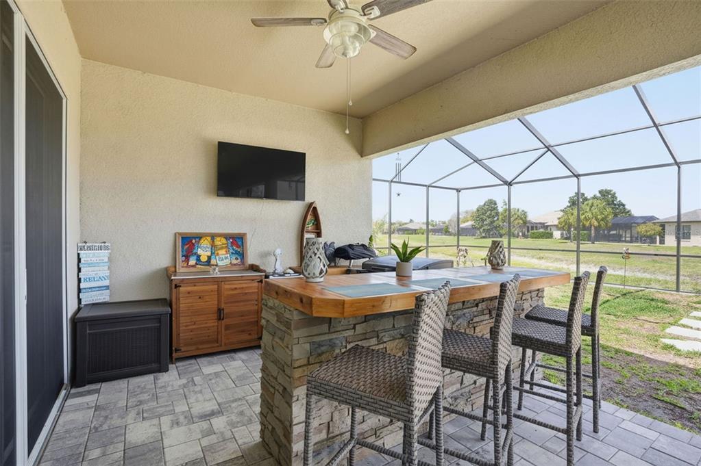9013 Mississippi Run Weeki Wachee, FL 34613 - Photo 47 of 99 a view of a dining room with furniture window and outside view