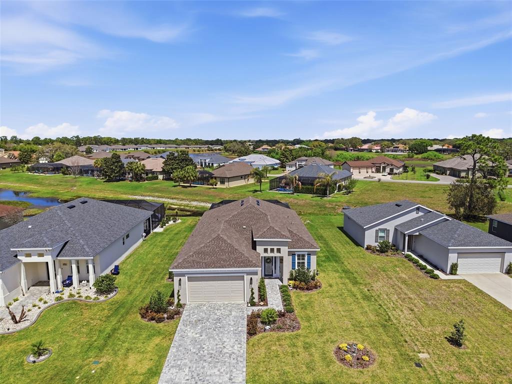 9013 Mississippi Run Weeki Wachee, FL 34613 - Photo 65 of 99 an aerial view of a house with a yard