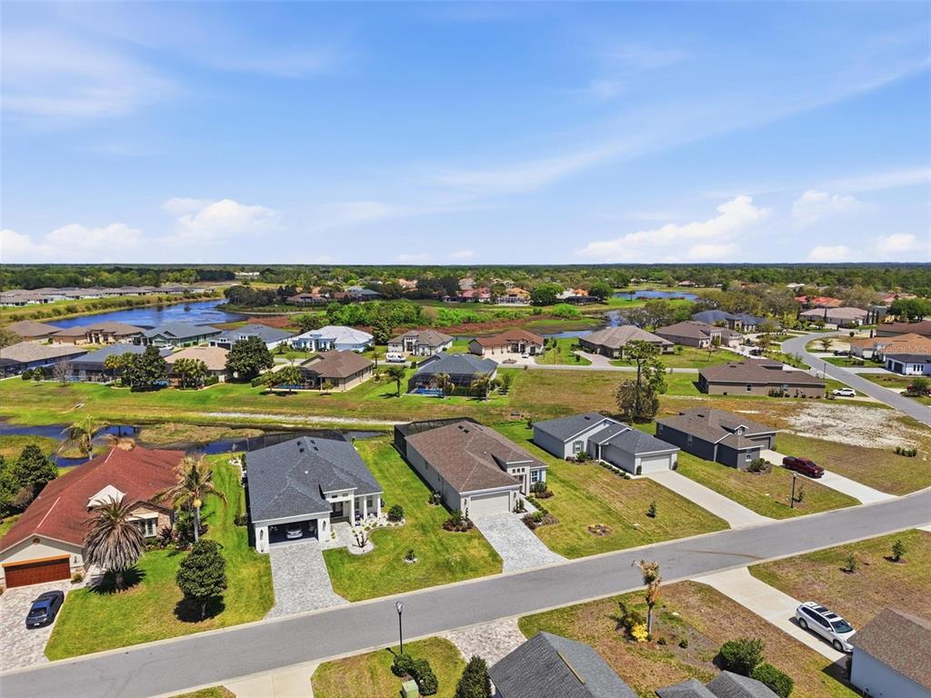 9013 Mississippi Run Weeki Wachee, FL 34613 - Photo 69 of 99 an aerial view of residential houses with outdoor space