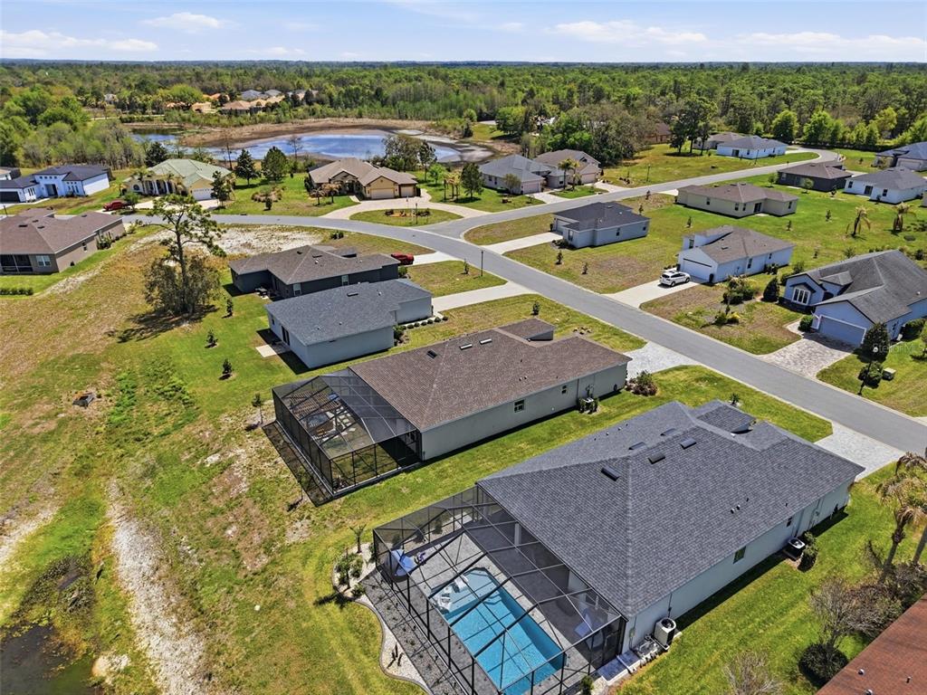 9013 Mississippi Run Weeki Wachee, FL 34613 - Photo 74 of 99 an aerial view of a house with a garden