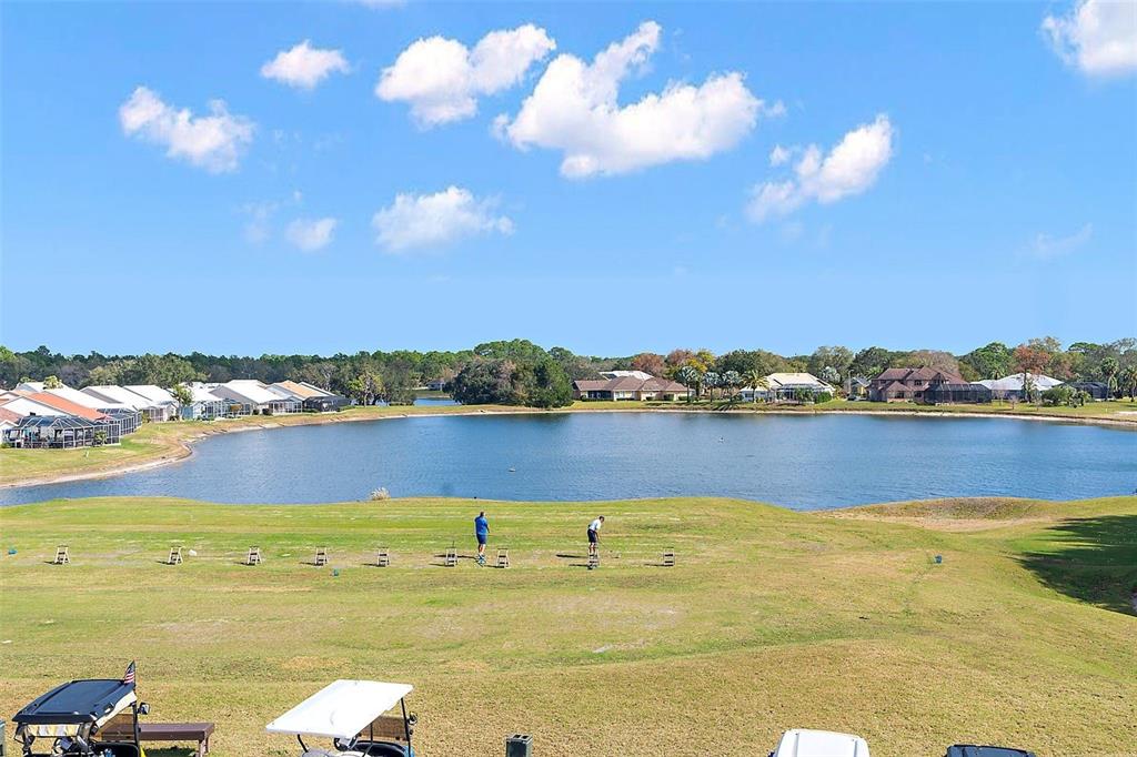 9013 Mississippi Run Weeki Wachee, FL 34613 - Photo 77 of 99 a view of a lake with houses in the back