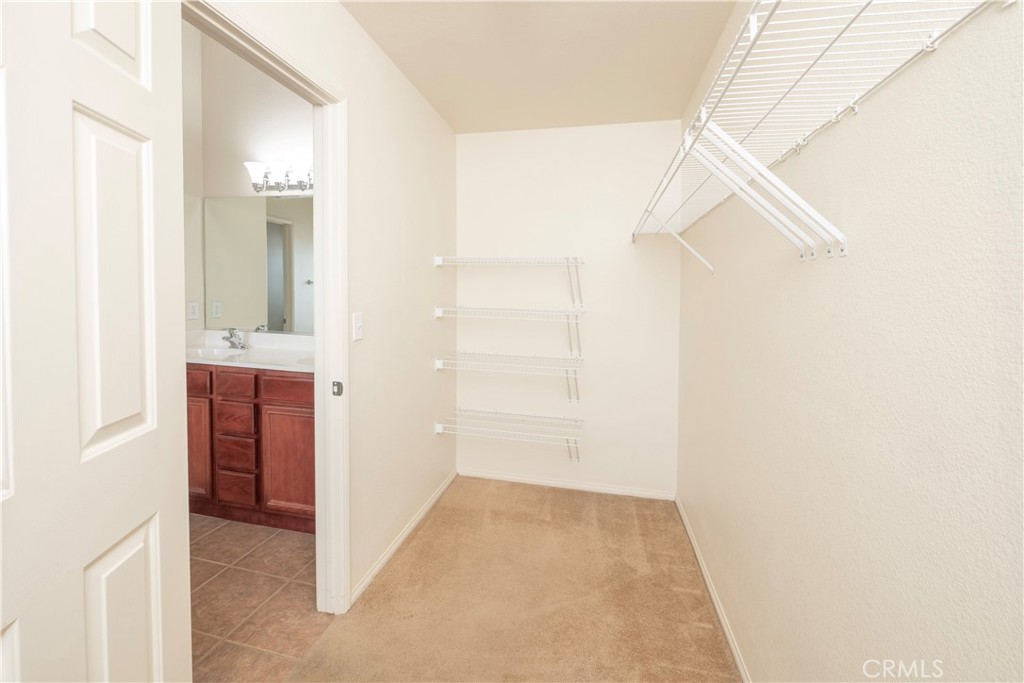 21189 Colombard Way Apple Valley, CA 92308 - Photo 21 of 48 a view of a hallway with hallway