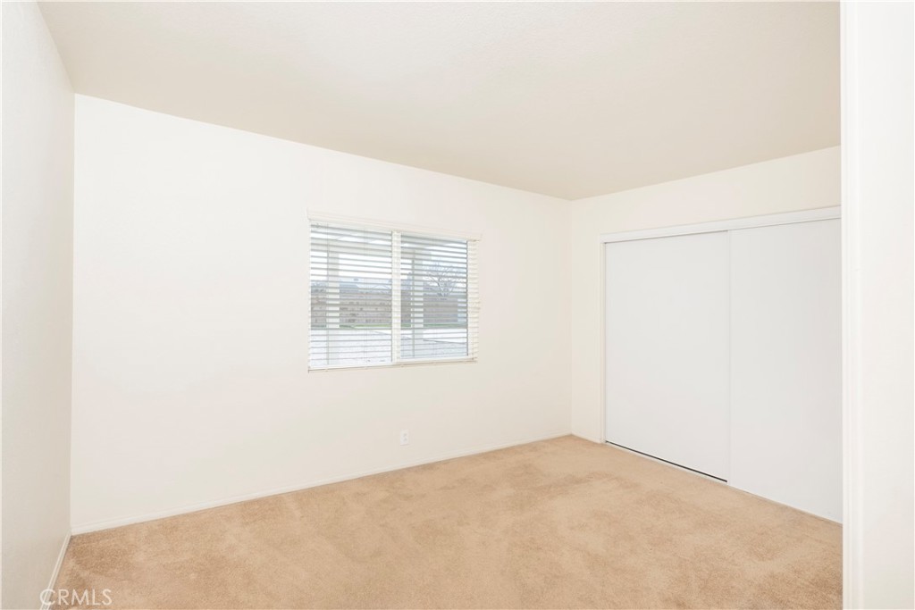 21189 Colombard Way Apple Valley, CA 92308 - Photo 28 of 48 an empty room with a window