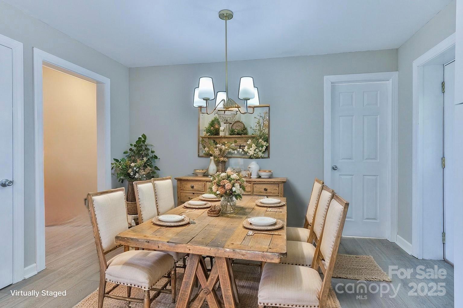 3424 Walker Circle Lenoir, NC 28645 - Photo 17 of 38 a view of a dining room with furniture window and wooden floor