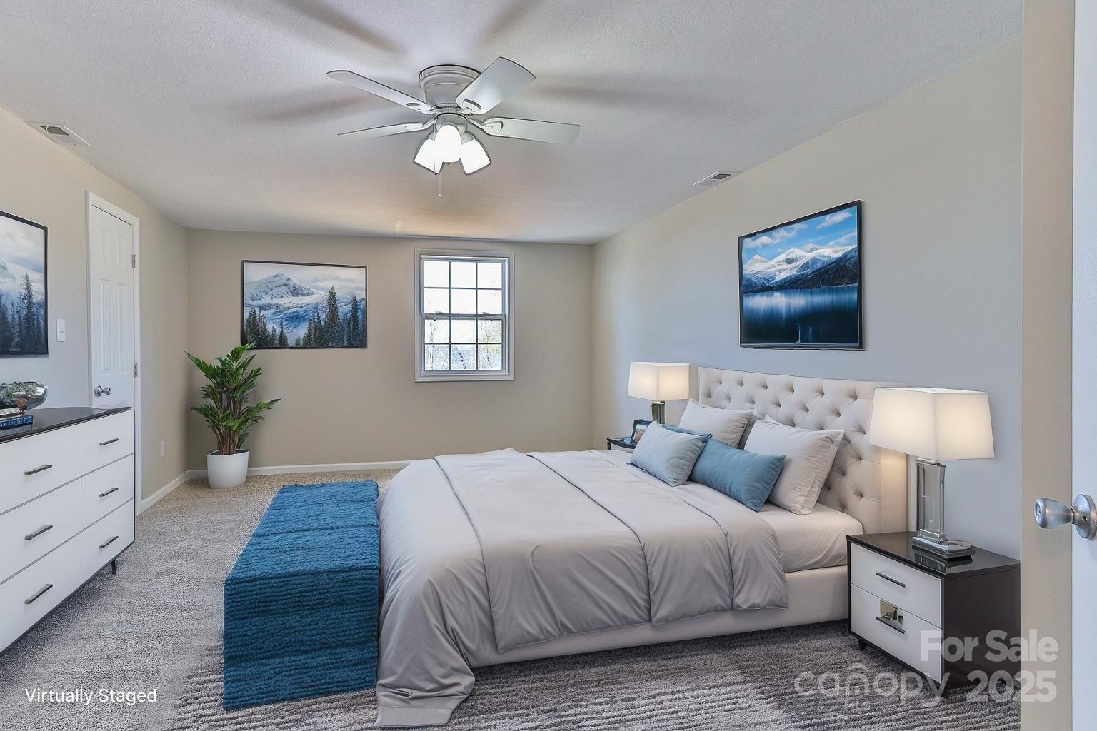 3424 Walker Circle Lenoir, NC 28645 - Photo 36 of 38 a bedroom with a bed and a lamp on dresser