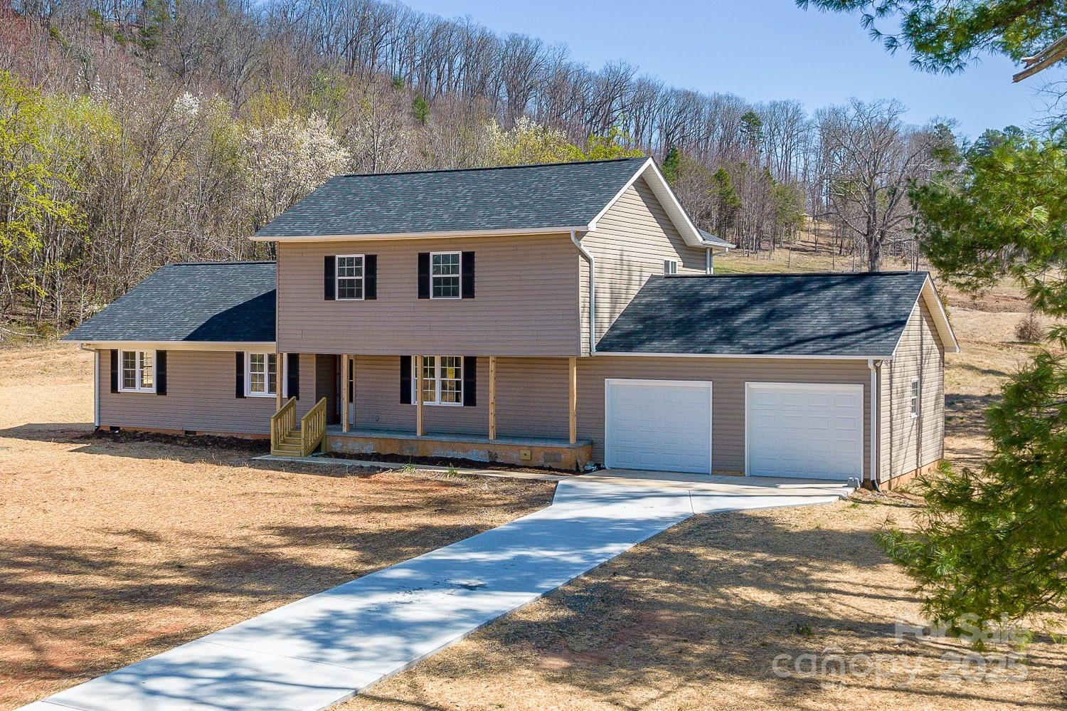 3424 Walker Circle Lenoir, NC 28645 - Photo 8 of 38 a front view of a house with a yard