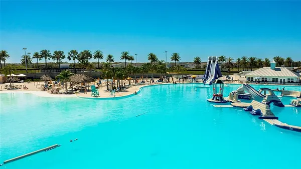 a view of a swimming pool with a patio