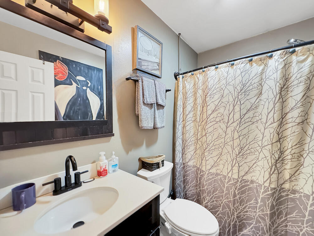 163 Granite Road Long Pond, PA 18334 - Photo 13 of 19 a bathroom with a sink and a mirror