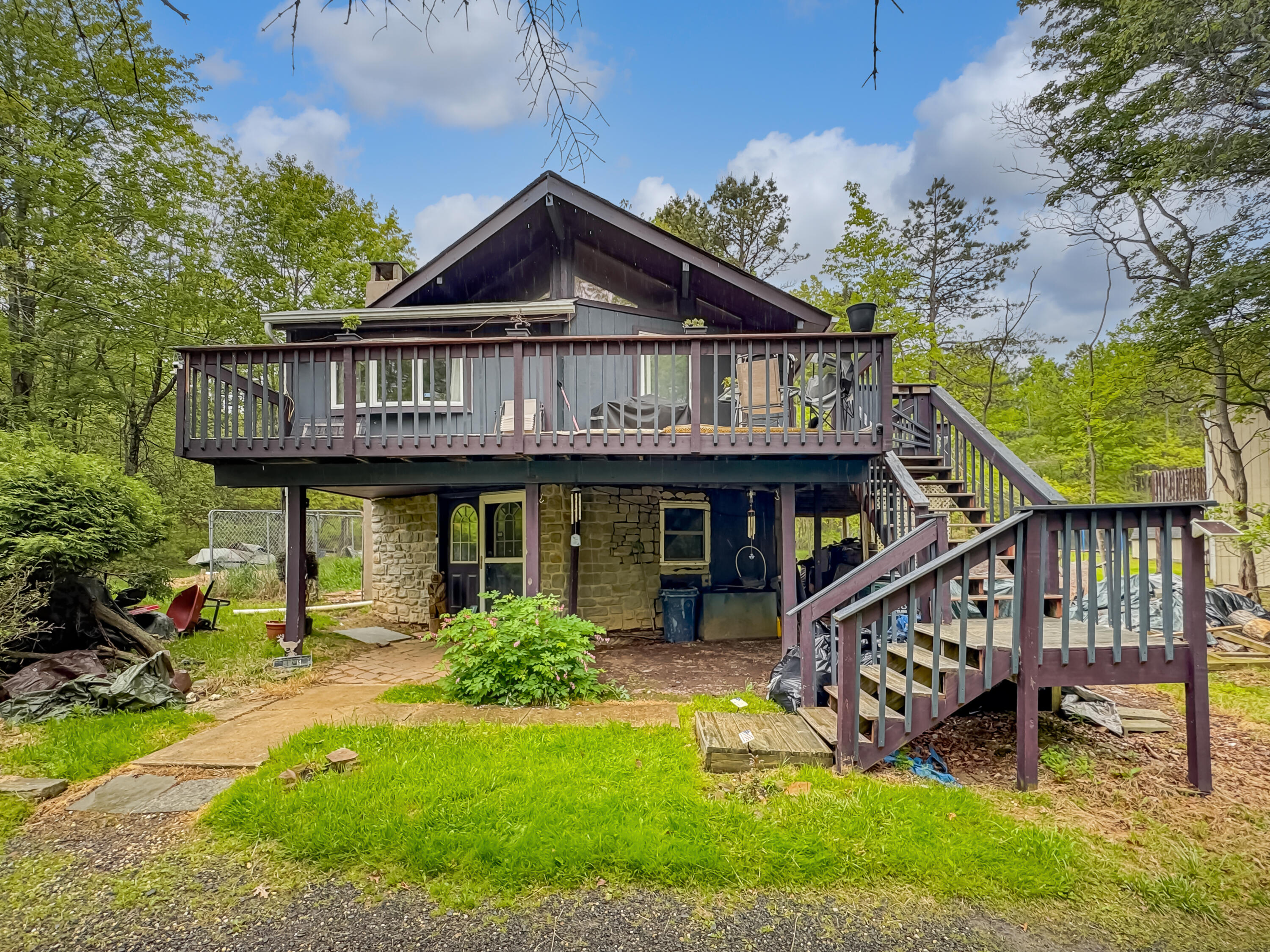 163 Granite Road Long Pond, PA 18334 - Photo 2 of 19 front view of house with a small yard