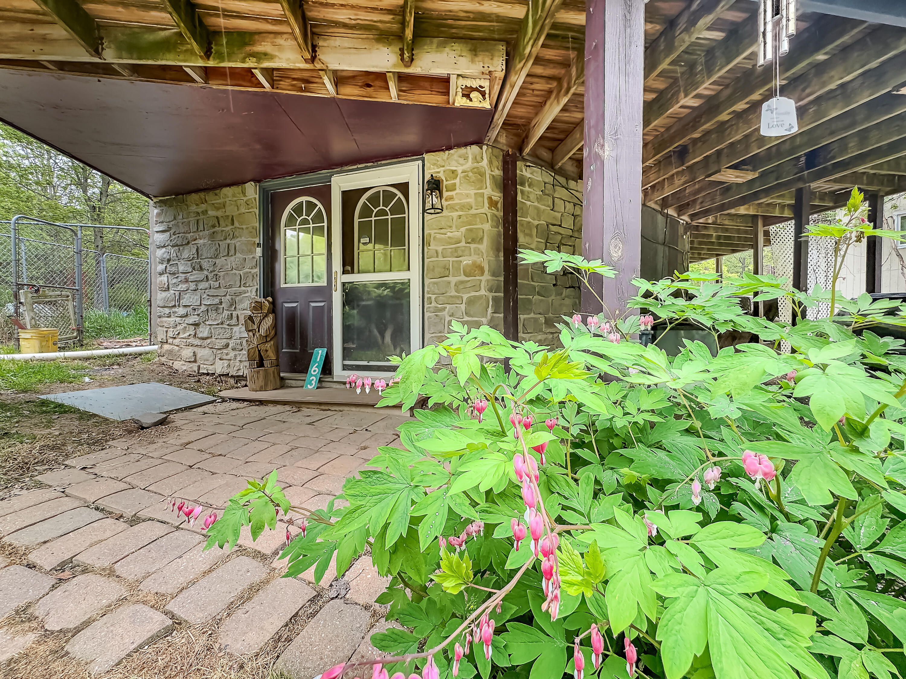 163 Granite Road Long Pond, PA 18334 - Photo 3 of 19 a front view of a house with garden