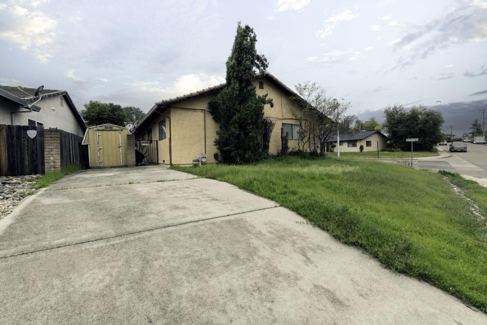 3305 Cessna Drive Redding, CA 96001 - Photo 3 of 15 a front view of house with yard and green space