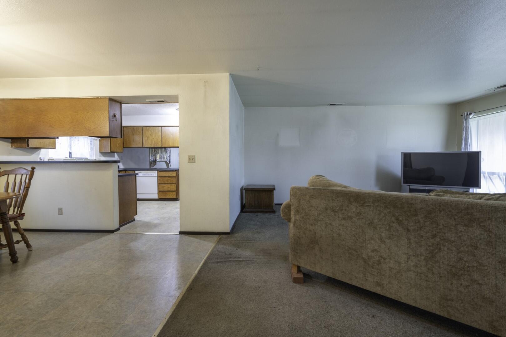 3305 Cessna Drive Redding, CA 96001 - Photo 5 of 15 a living room with furniture and a flat screen tv