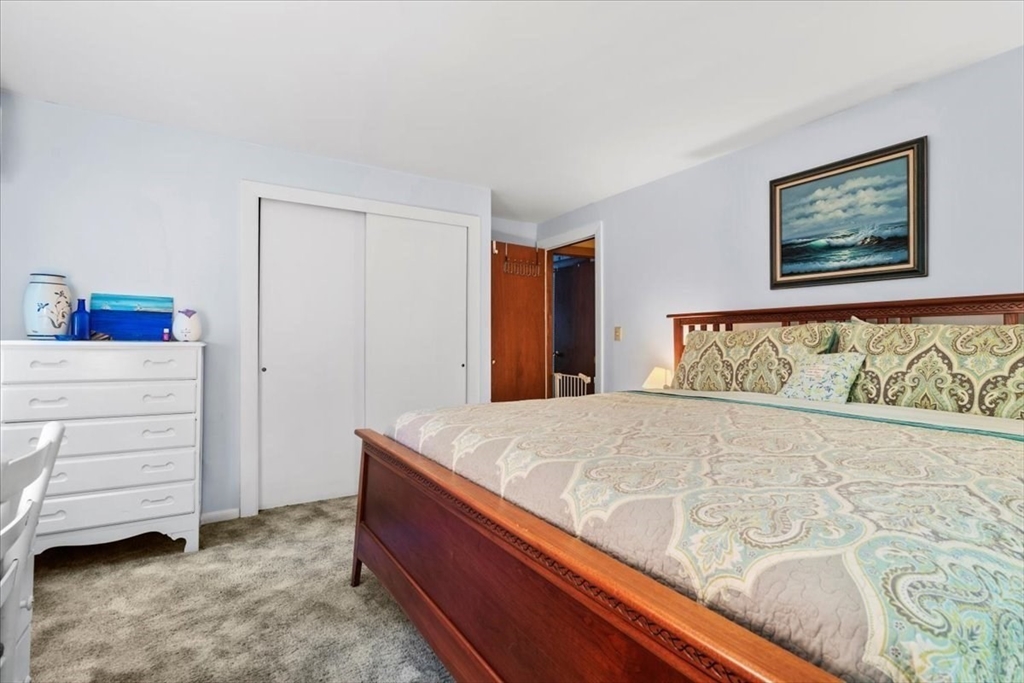 31 Lawton Road Shirley, MA 01464 - Photo 17 of 37 a bedroom with a bed and a window