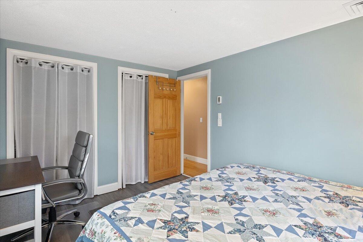 24 Regency Drive Sagamore, MA 02561 - Photo 17 of 27 a bedroom with a bed and a window