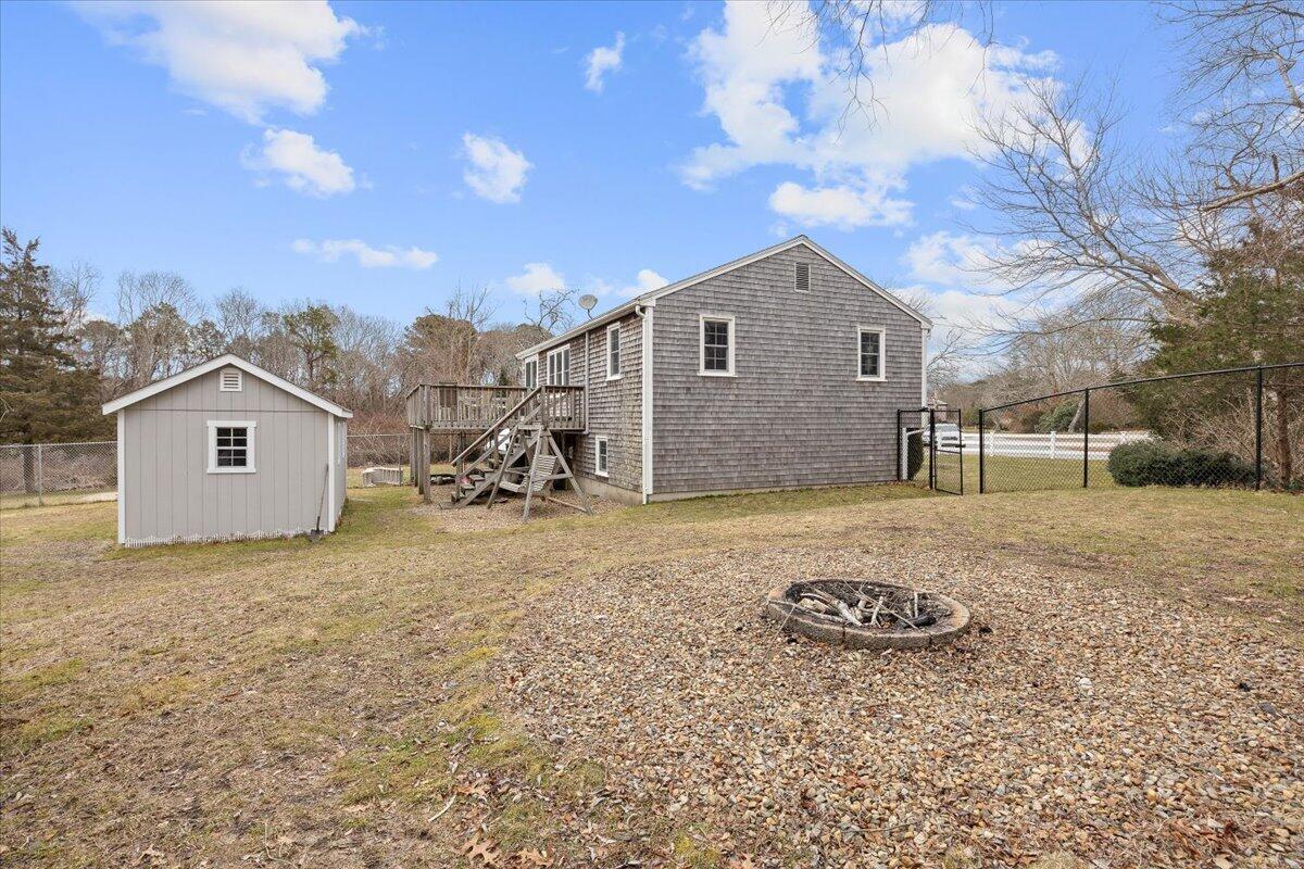 24 Regency Drive Sagamore, MA 02561 - Photo 23 of 27 a house view with a backyard space