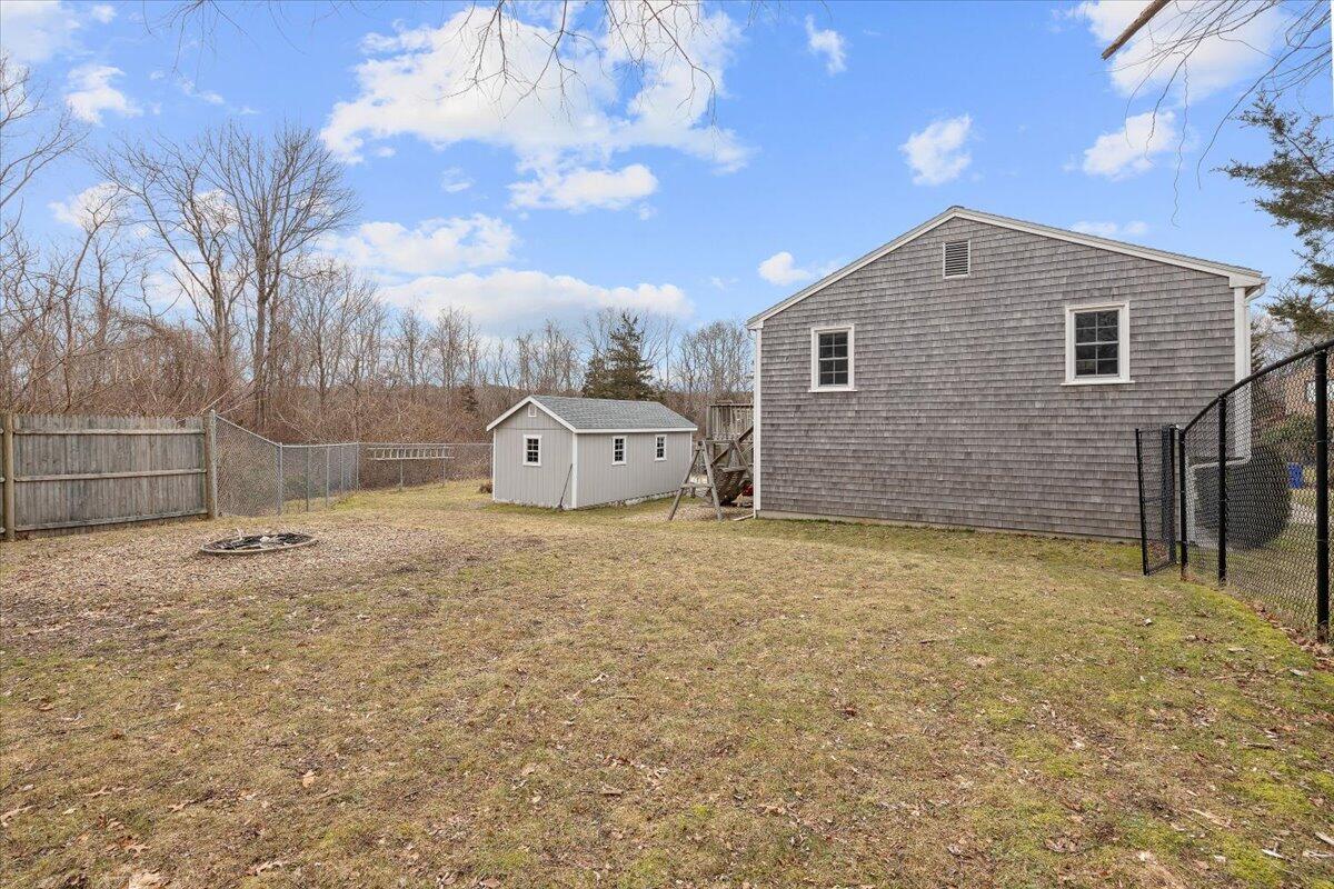 24 Regency Drive Sagamore, MA 02561 - Photo 24 of 27 a house view with a backyard space