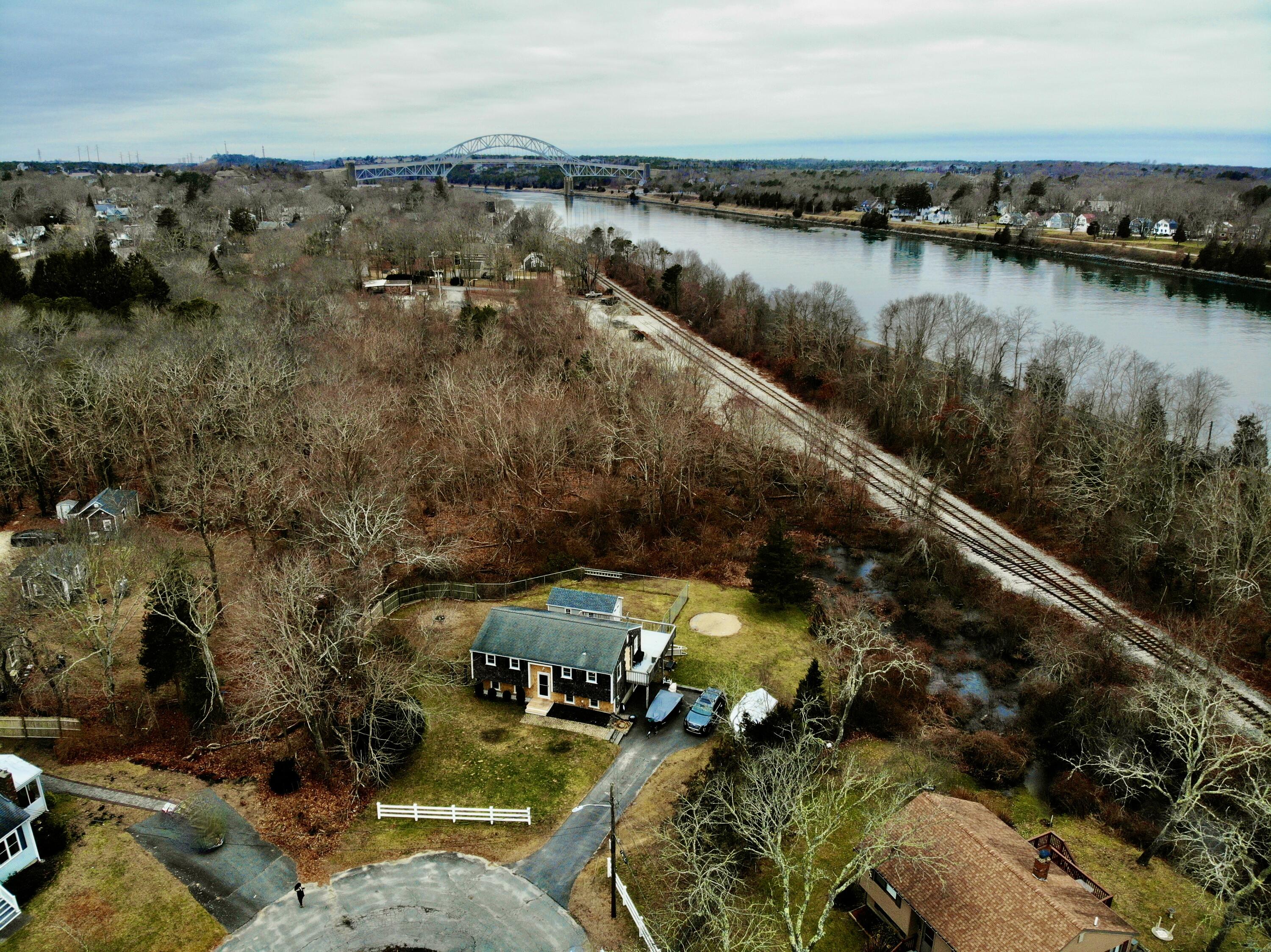 24 Regency Drive Sagamore, MA 02561 - Photo 5 of 27 a view of a lake with houses