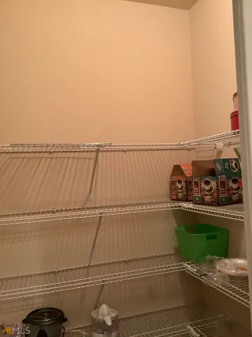 a view of a balcony with an ocean