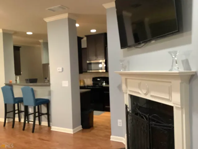 a kitchen with a table and chairs