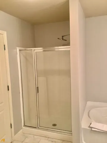 a view of entryway with wooden floor