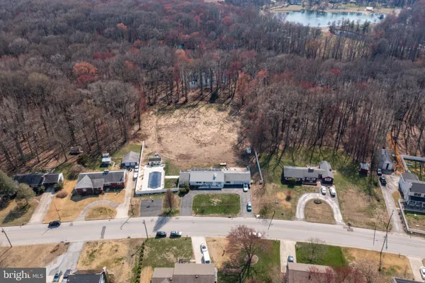 a view of houses with yard