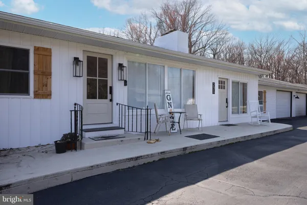 a front view of a house with porch