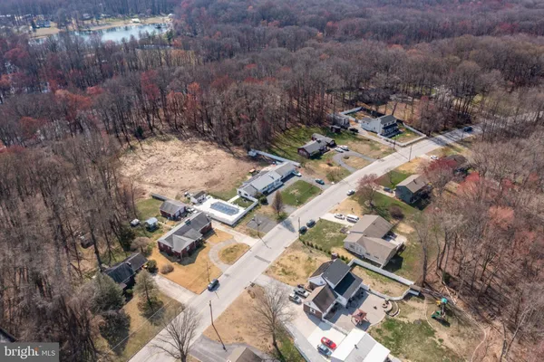 an aerial view of residential house with outdoor space