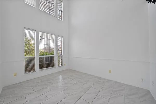 a view of a hallway with staircase