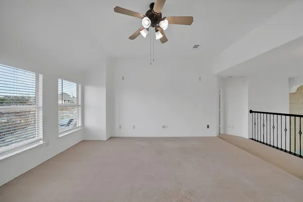 a bathroom with a sink a toilet a mirror and bathtub