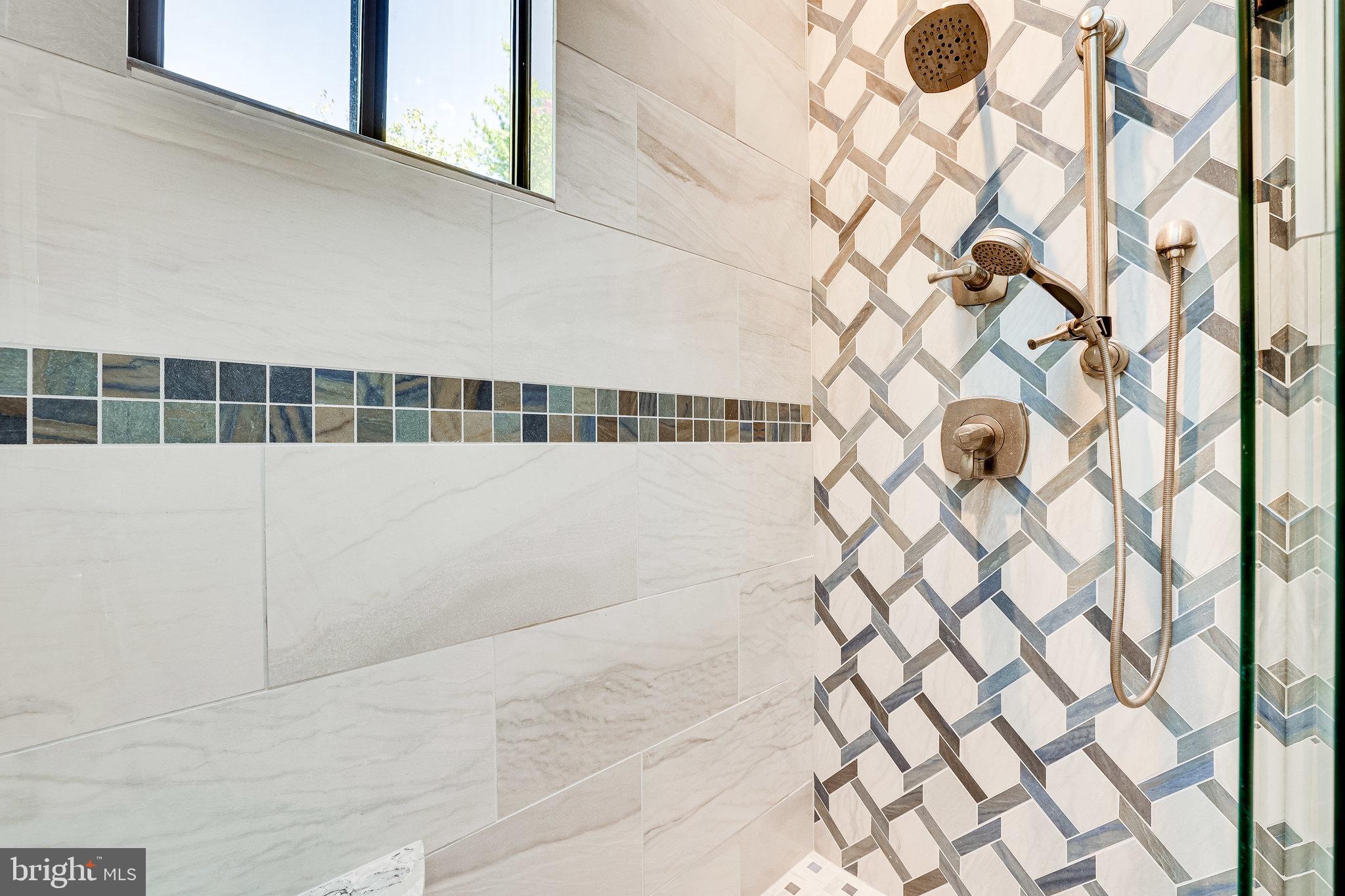 1667 Cedar Hollow Way Reston, VA 20194 - Photo 15 of 28 Close up detail of the beautiful shower tile...