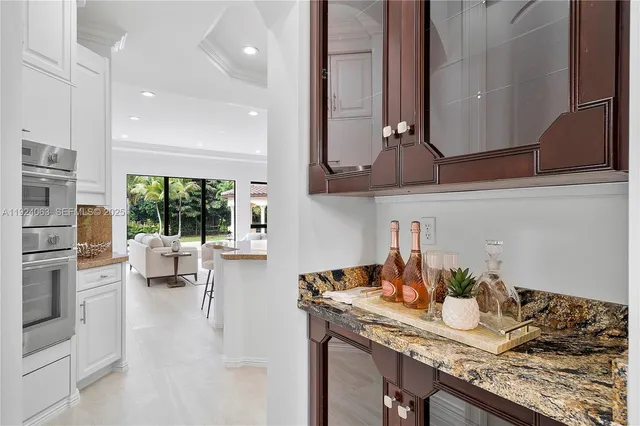 a kitchen with granite countertop lots of counter top space