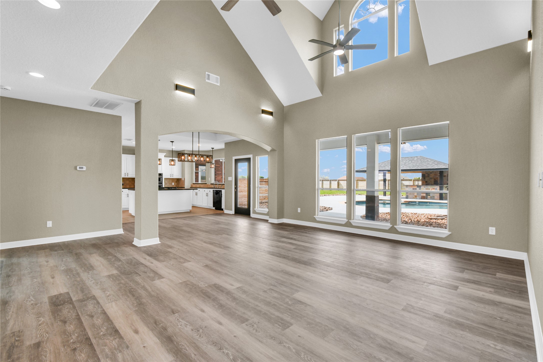 863 Bunkhouse Trail Angleton, TX 77515 - Photo 4 of 22 Living room with high ceilings and lots of natural light!