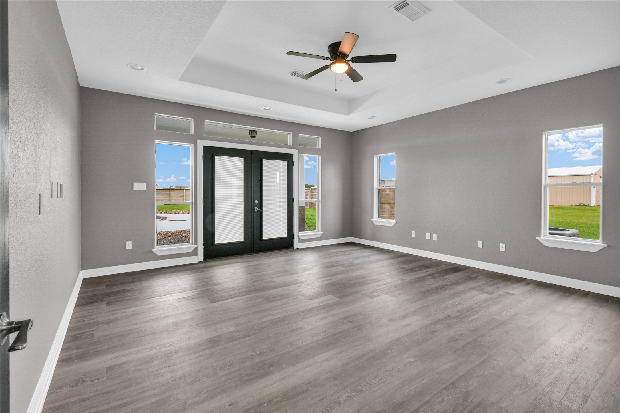 863 Bunkhouse Trail Angleton, TX 77515 - Photo 9 of 22 Primary bedroom with french doors to backyard