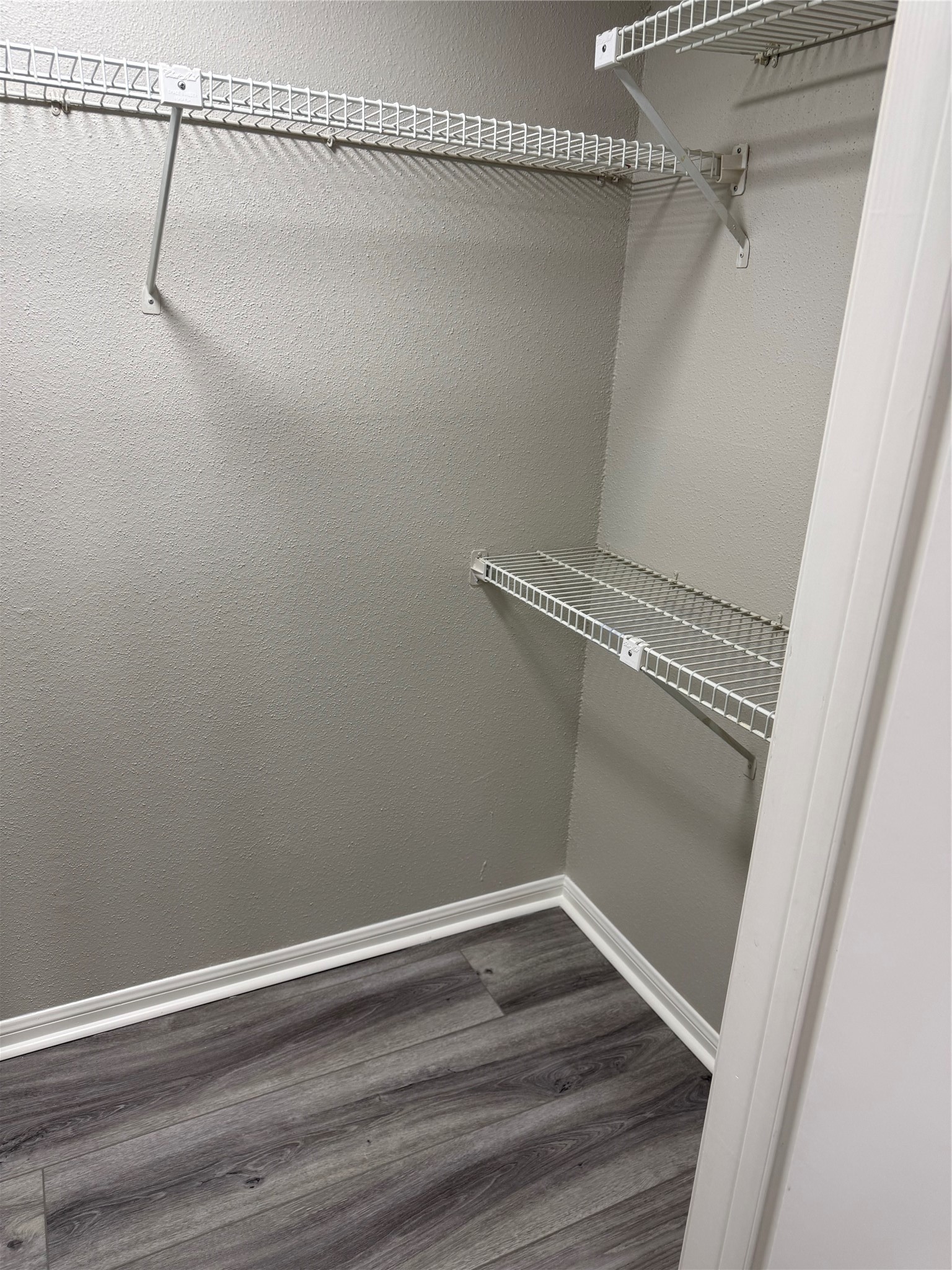 7575 Cambridge Street, Unit 2804 Houston, TX 77054 - Photo 26 of 38 a view of a room with racks on the wall