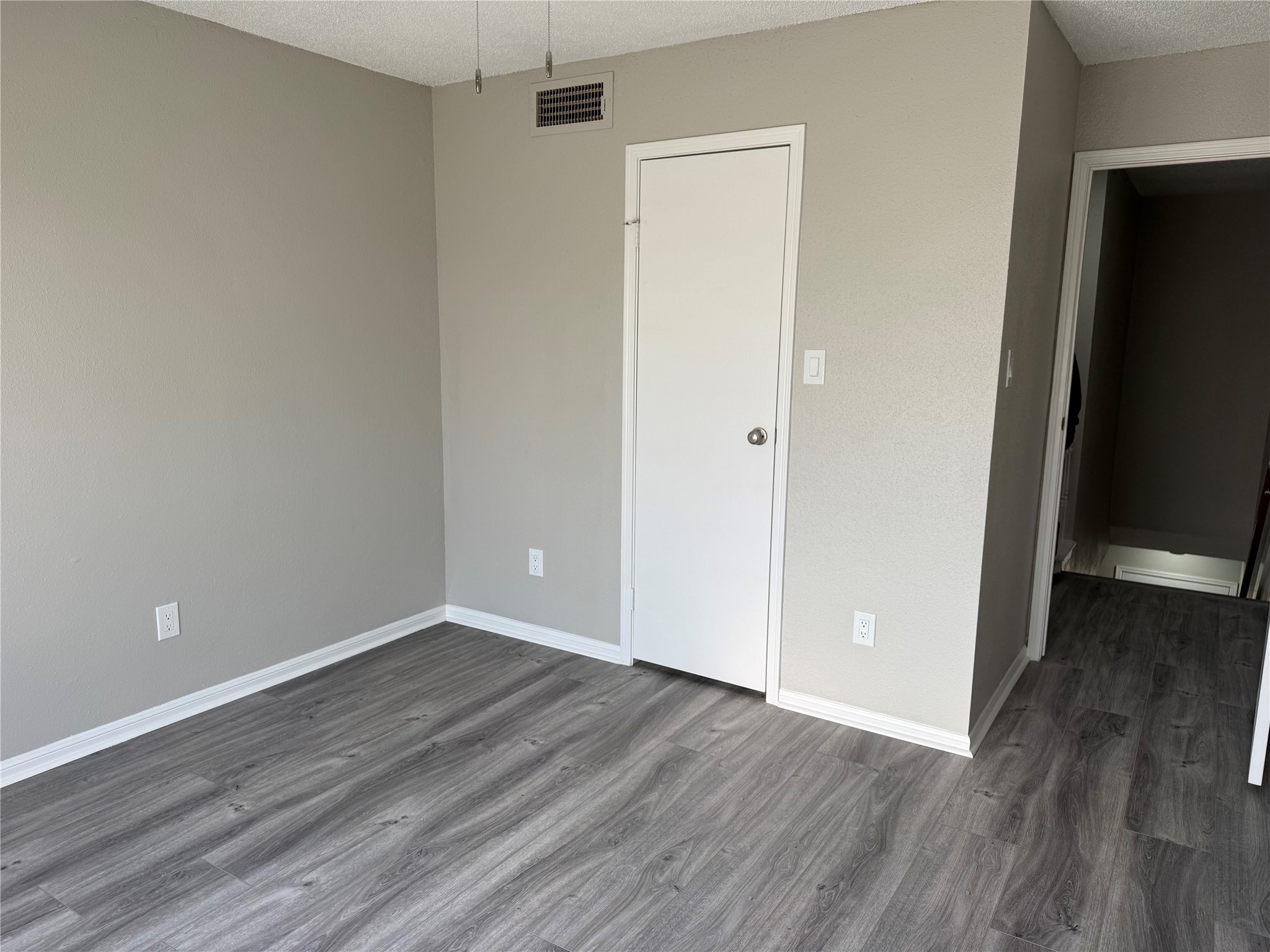 7575 Cambridge Street, Unit 2804 Houston, TX 77054 - Photo 29 of 38 a view of an empty room with wooden floor
