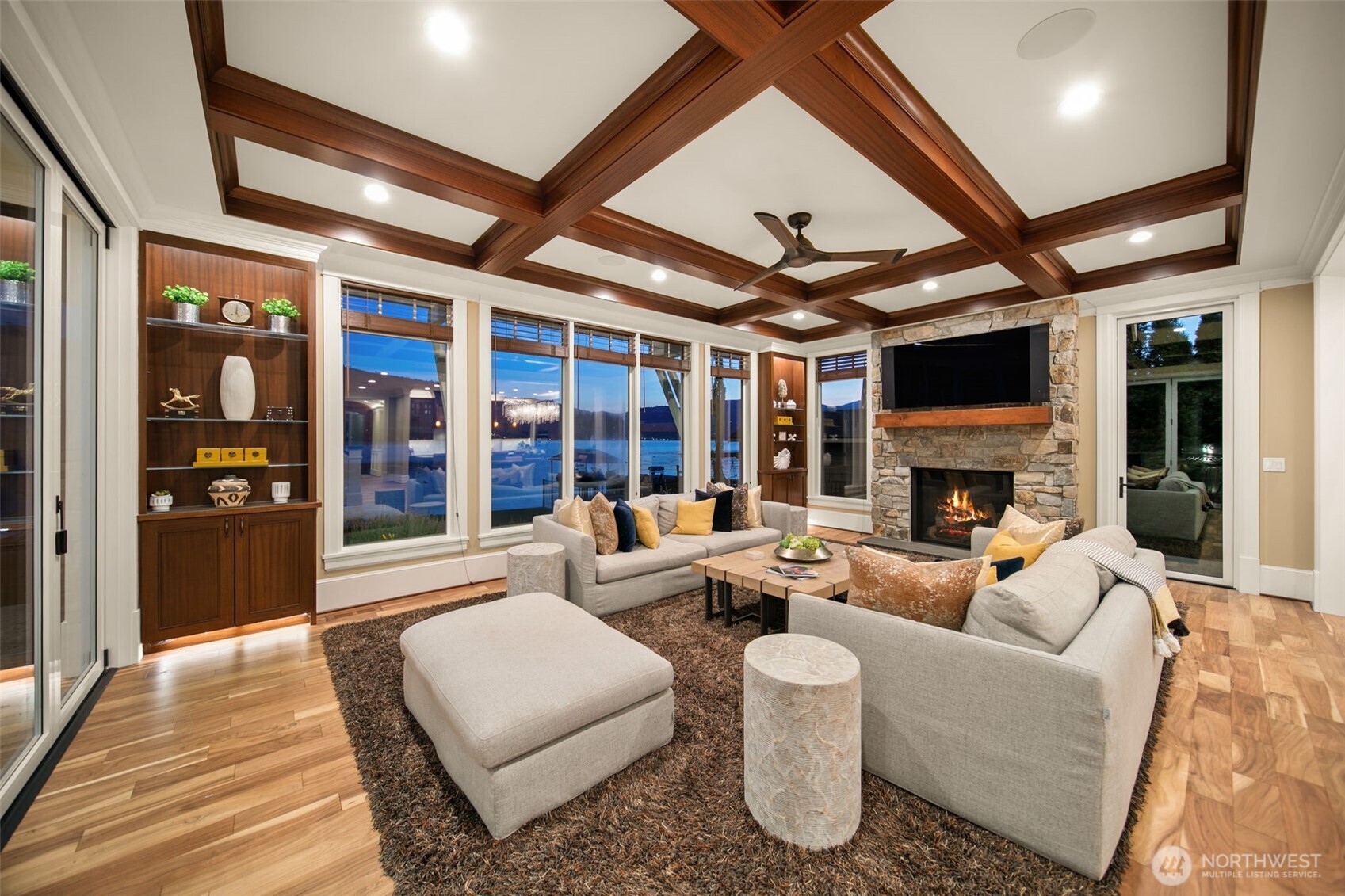 58 Key Bay Lane Chelan, WA 98816 - Photo 17 of 40 a living room with fireplace furniture and a large window