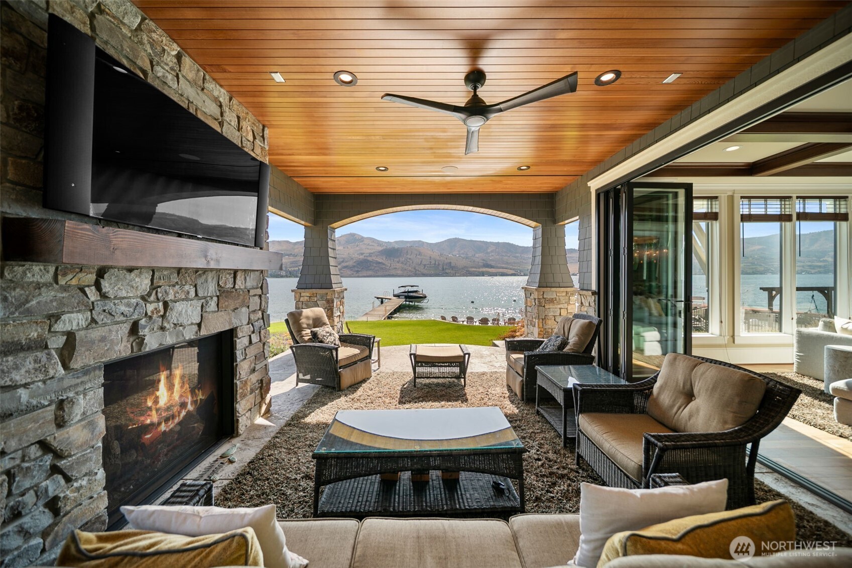 58 Key Bay Lane Chelan, WA 98816 - Photo 19 of 40 a view of a livingroom with furniture and a fireplace