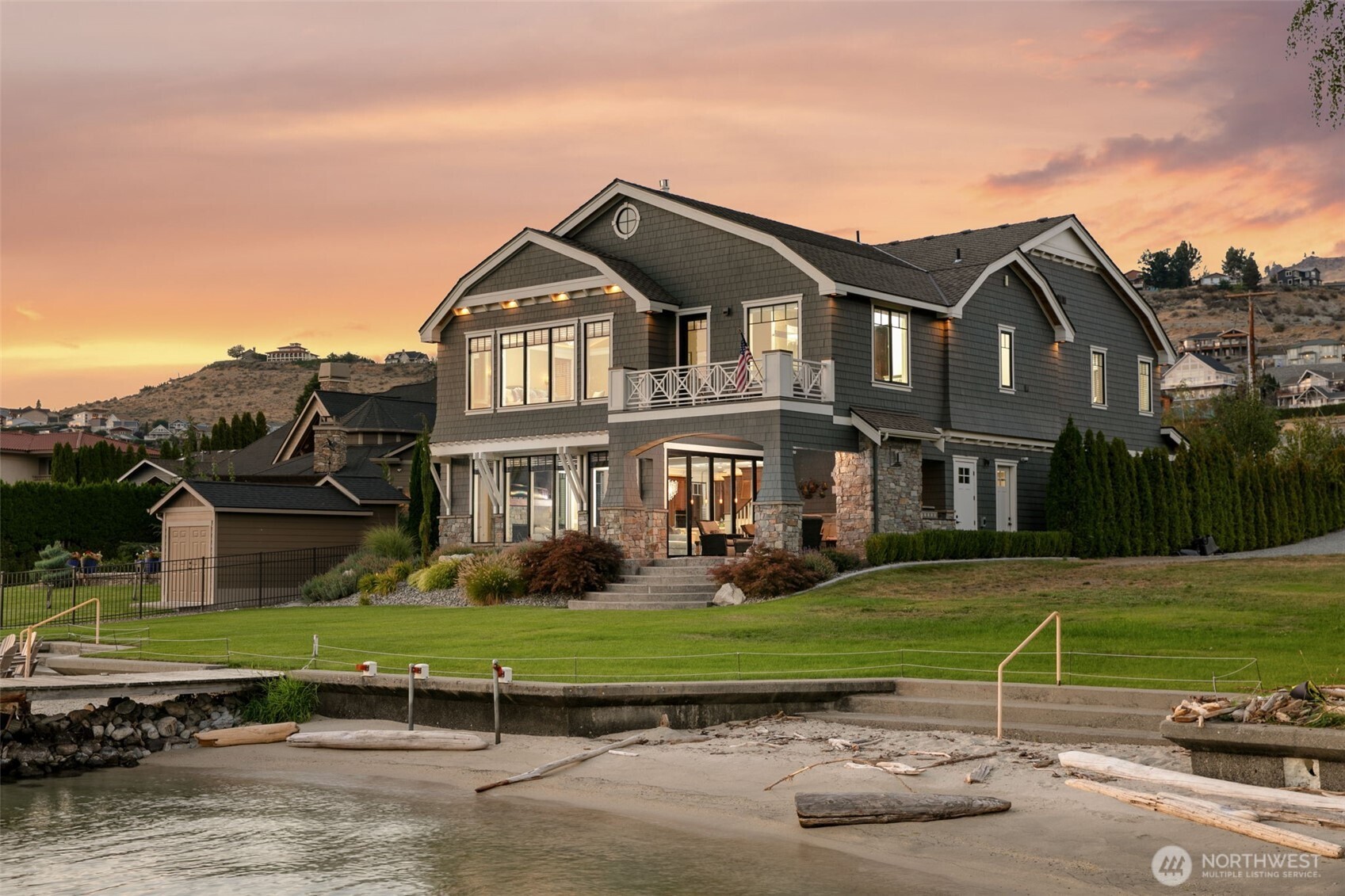 58 Key Bay Lane Chelan, WA 98816 - Photo 2 of 40 a front view of a house with a yard