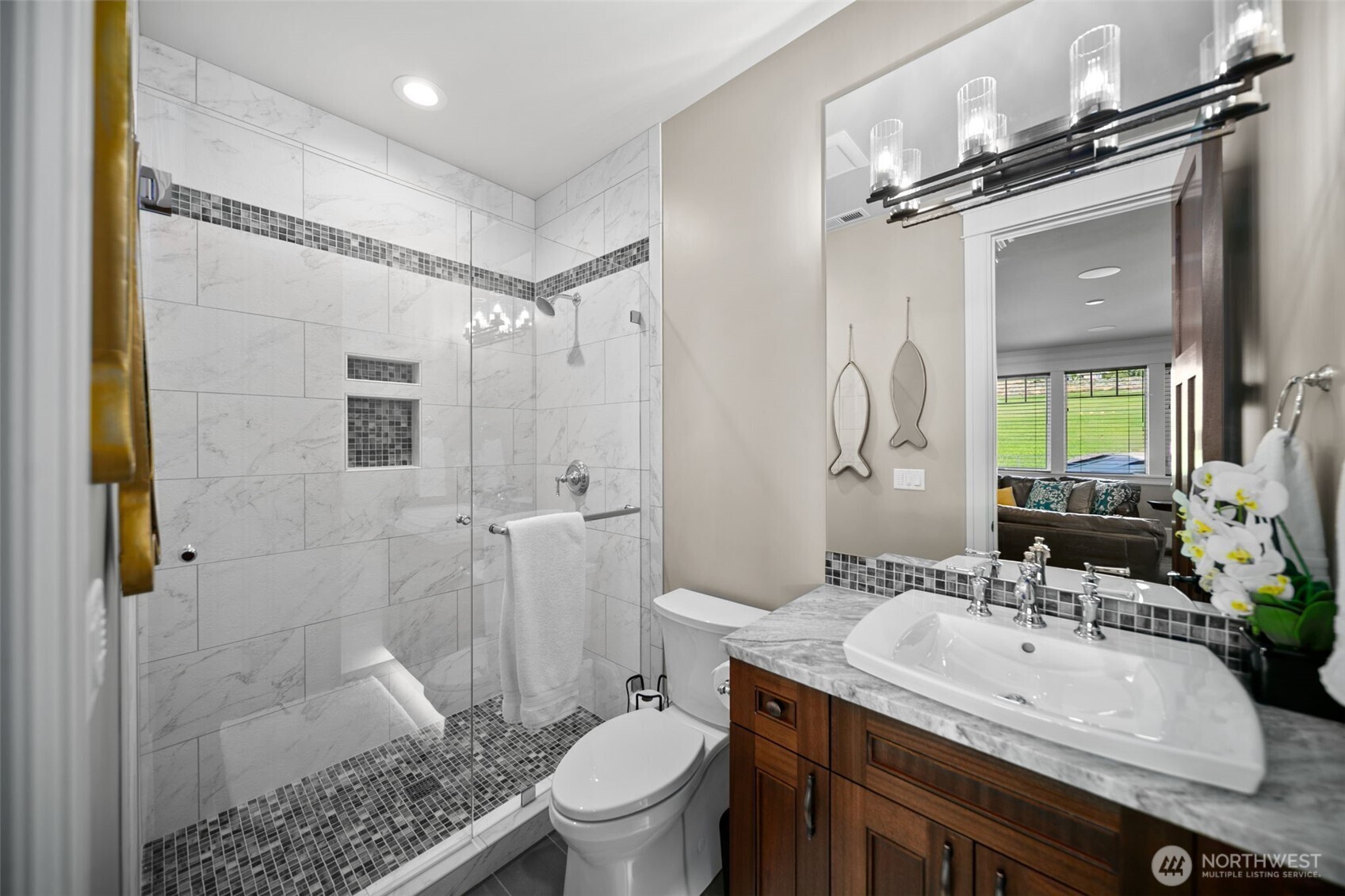 58 Key Bay Lane Chelan, WA 98816 - Photo 34 of 40 a bathroom with a sink toilet vanity and shower