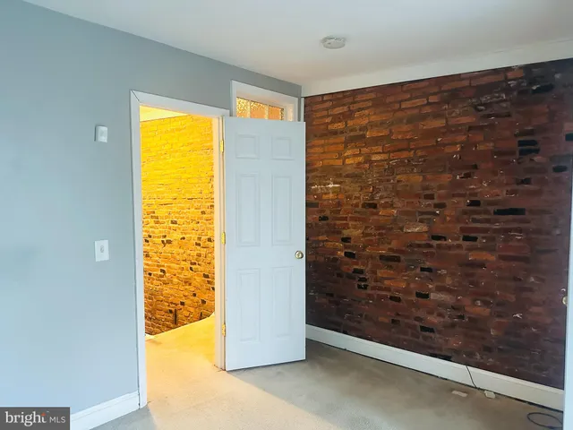 a view of swimming pool with a balcony