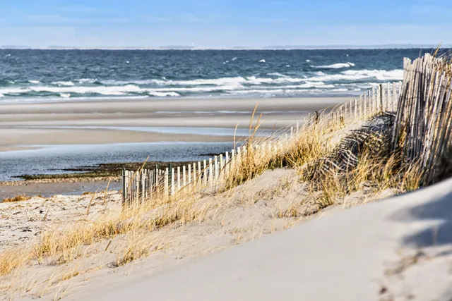 a view of water heater and a refrigerator
