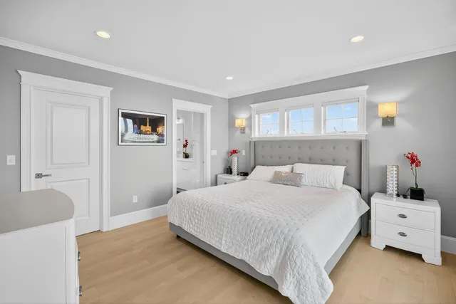 a bathroom with a sink double vanity and a mirror
