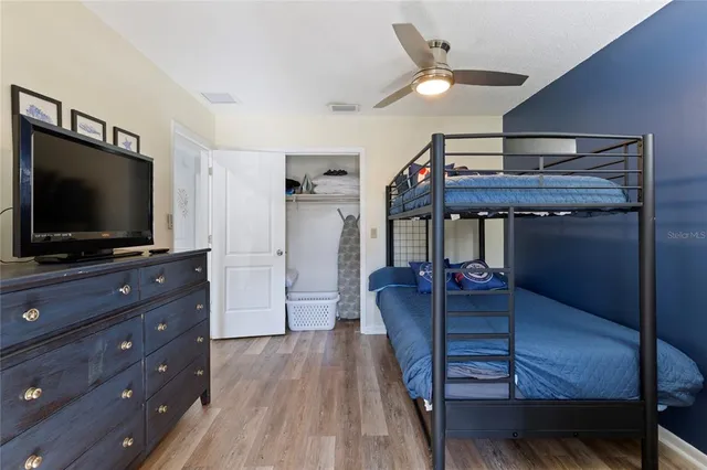 a room with furniture and flat screen tv