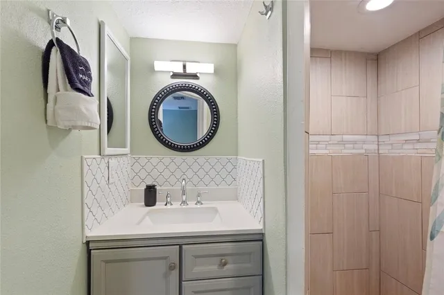 a utility room with a sink a washer and dryer