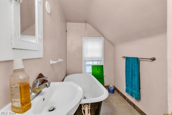 3654 Avalon Road, Unit 2 Cleveland, OH 44120 - Photo 27 of 36 Bathroom with sink, vaulted ceiling, and tile floors