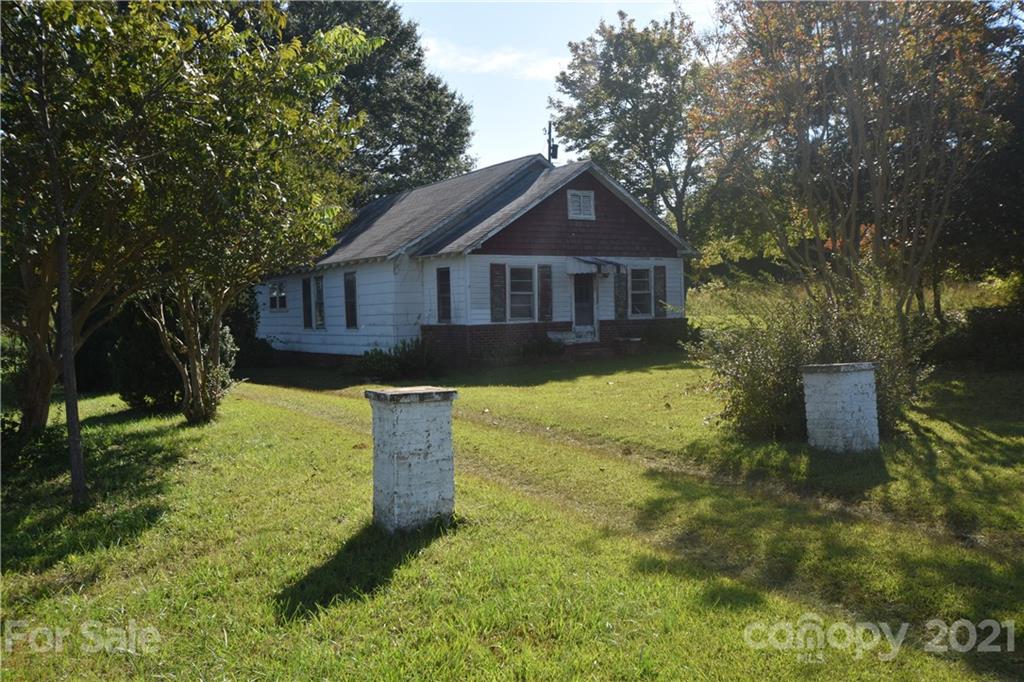 1051 Poors Ford Road Rutherfordton, NC 28139 - Photo 18 of 21 a front view of a house with a yard