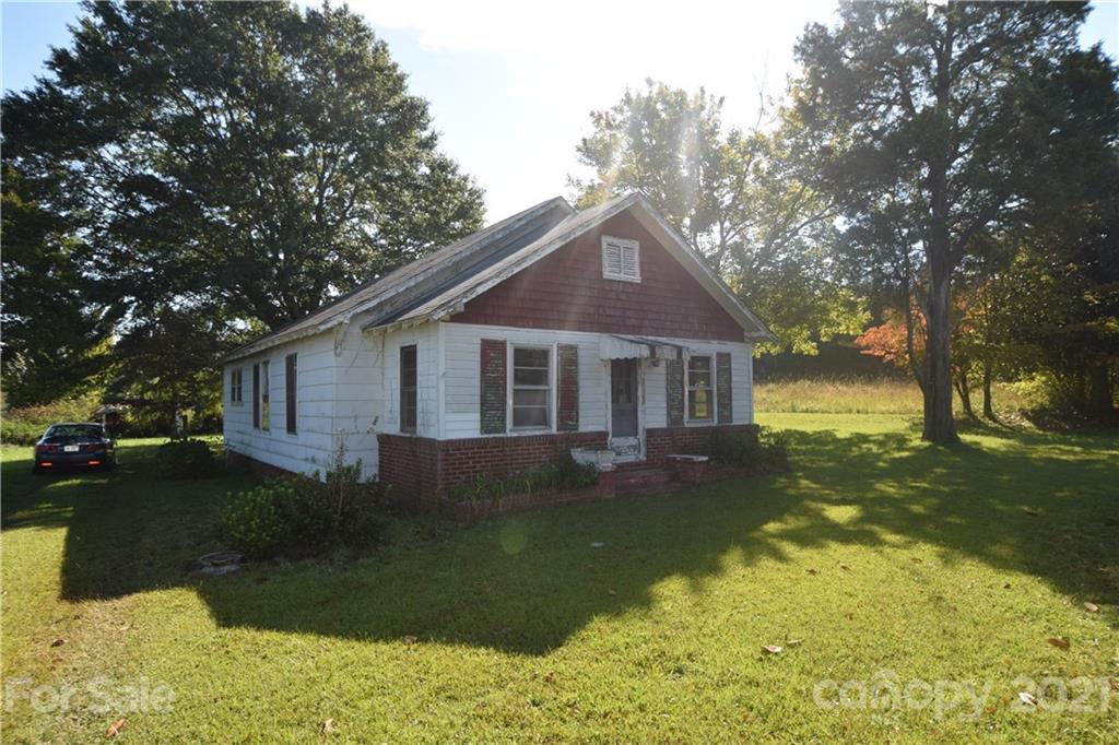 1051 Poors Ford Road Rutherfordton, NC 28139 - Photo 21 of 21 a front view of a house with yard and green space