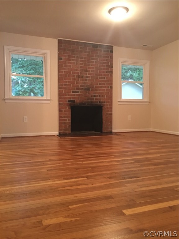 1439 Robindale Road Richmond, VA 23235 - Photo 5 of 23 cozy woodburning fireplace off kitchen area