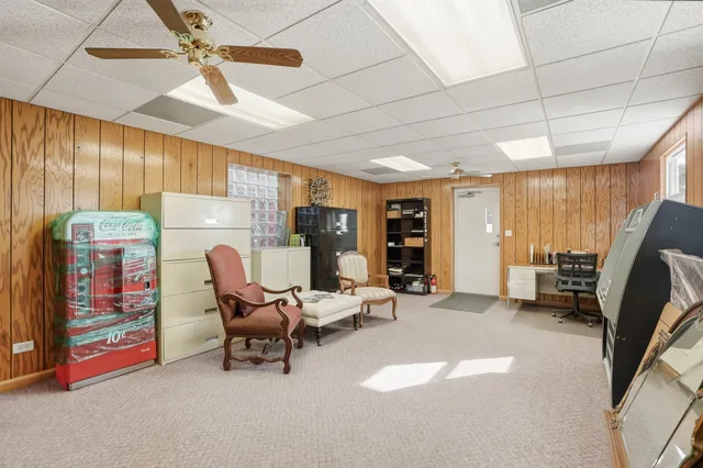 a room with furniture and a flat screen tv